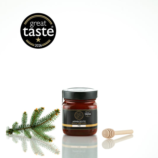 Aphrodite Raw Fir Honey 250g jar with fir sprig and wooden honey dipper, 2026 Great Taste award badge